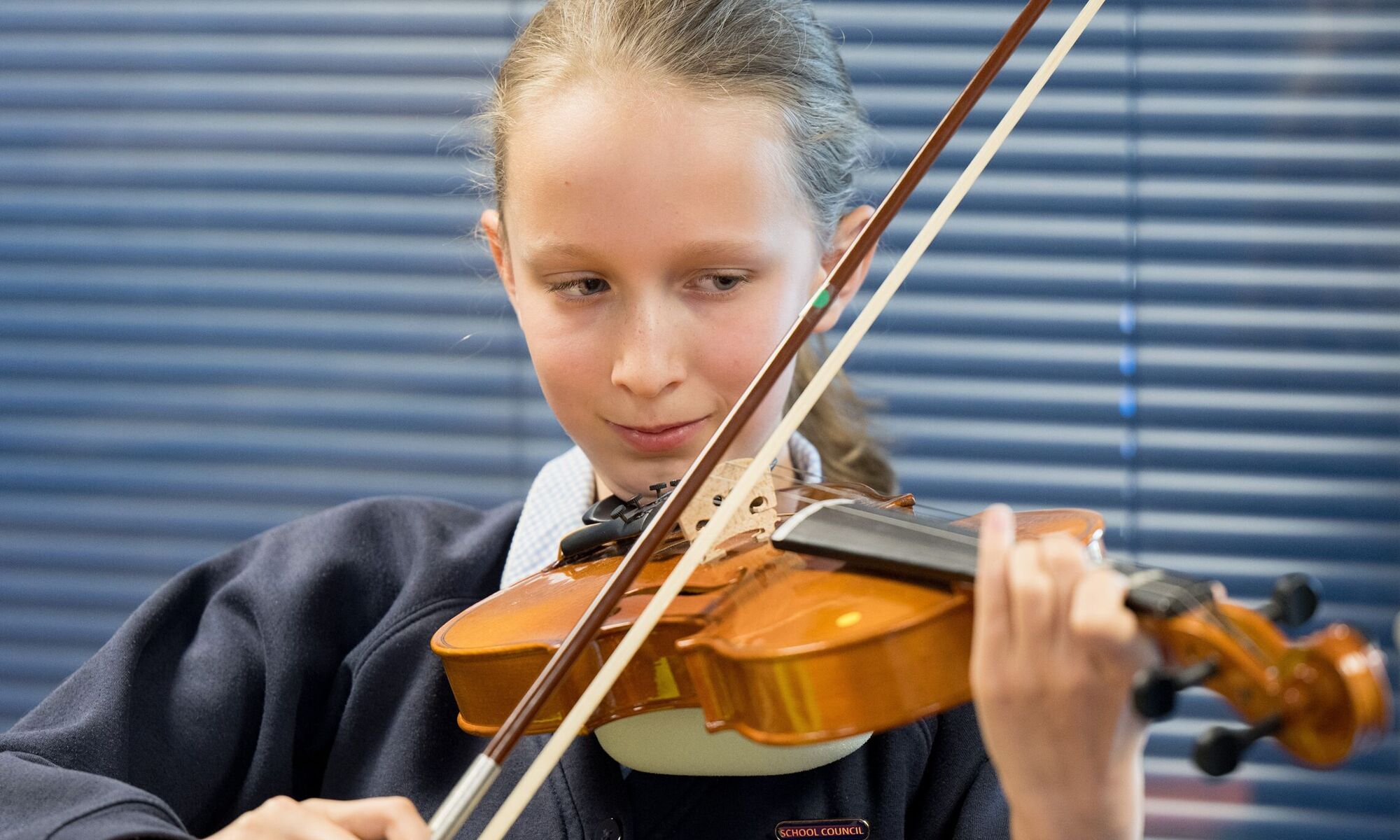 Hookstone Chase Primary School - a pupil playing the violin